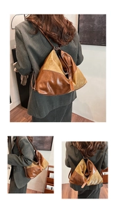 Détail du design en cuir patchwork vintage et des coutures de ce sac polyvalent moderne