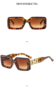 Macro view of square tortoise shell sunglasses with gold hollow temple detail