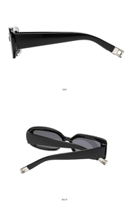 Detailansicht der Seite und Rückseite einer schwarzen ovalen Sonnenbrille mit Metallakzent