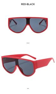 Vorder- und Seitenansicht der roten Oversize-Schild-Sonnenbrille mit grauen Gläsern