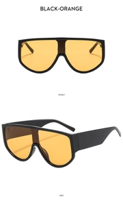 Vorder- und Seitenansicht der übergroßen schwarzen Sonnenbrille mit orangen Gläsern
