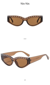 Detailansicht der Cateye-Sonnenbrille mit braunem Acetatrahmen und Perlenverzierung