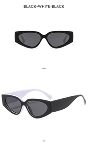 Detailed front and side views of black and white cat-eye sunglasses with dark gray lenses