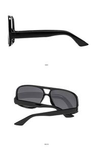 Detail view showing side and back angles of black oversized aviator sunglasses