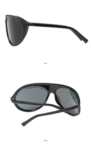 Vue latérale et arrière des lunettes de soleil oversize noires brillantes au design épuré