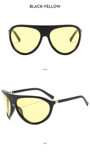 Détail de lunettes de soleil aviateur avec monture noire et verres jaunes de face et de profil
