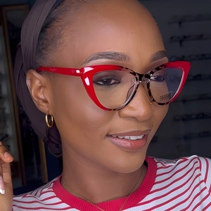 Red cat-eye fashion glasses frame with tortoiseshell temples for women stylish look