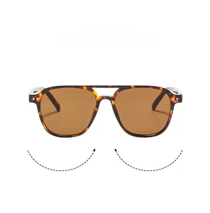 Détail de lunettes aviateur écaillées avec double pont classique et rivets argentés fins