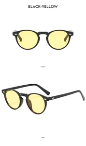 Detailansicht der Retro-Boston-Sonnenbrille in Schwarz mit gelben Gläsern und Silbernieten