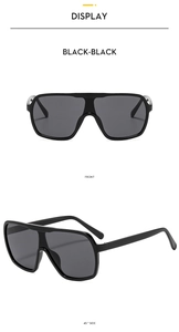 Front and 45-degree side view of oversized black square sunglasses with silver metal accents