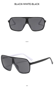 Front and side views of oversized black and white sports style fashion sunglasses