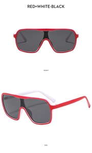 Front and side detail view of oversized contrast red and white sunglasses with dark lenses
