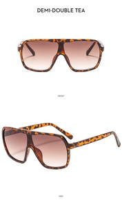 Front and side view of oversized tortoiseshell sunglasses with brown gradient lenses