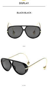 Detailed front and side views of black pilot sunglasses with golden curved drop-shape temples