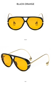 Detail of aviator sunglasses with gold metal temples and teardrop decorative ends