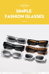 Flat lay of trendy thick rectangle sunglasses in black, white, grey, and tortoise patterns
