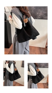 Detailed views of a black suede tote bag featuring a cute brown plush bear charm
