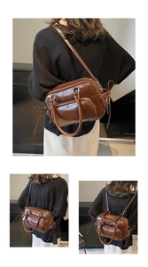 Detail view of the brown retro leather backpack showing multiple carrying styles and textures