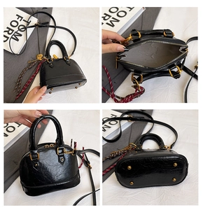 Detailed views of a black mini shell bag with gold hardware and woven rope charm detail