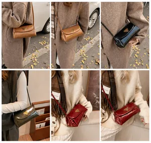 Multiple views of retro oiled leather crossbody bag with triangle metal buckle detail