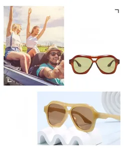Detail der Retro-Y2K-Pilotenbrille in rotbraunem und beigeem Rahmen mit getönten Gläsern
