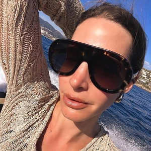 Tortoiseshell shield sunglasses with gradient lenses and metal temple accents
