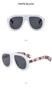 Front and side views of oversized white oversized sunglasses with marbled purple temples