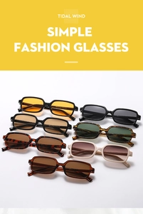 Flat lay of retro square sunglasses collection in seven colors on white background