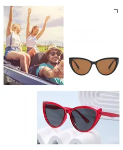 Detail of vintage cat-eye sunglasses in black and transparent red frames with UV protection
