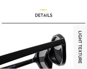 Close-up of black polished vintage oval sunglasses showing hinge detail and size specifications