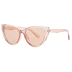 Elegant cat-eye sunglasses with translucent peach pink frames and high-gloss lenses