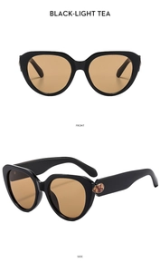 Front and side view of cat-eye sunglasses with black frames and light tea lenses