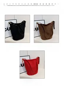 Three suede bucket bags in black, brown, and red colors with adjustable shoulder straps