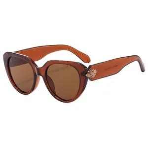Fashion vintage cat-eye sunglasses with brown translucent frames and tinted lenses