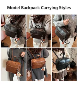 Detailansicht von Vintage-Lederrucksäcken in Dunkelbraun, Karamellbraun und Schwarz