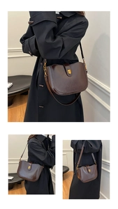 Detailansicht der dunkelbraunen Beuteltasche mit goldener Schnalle und Trageriemen