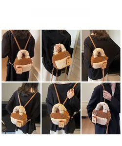 Detail view of plush patchwork bowling bag with adjustable brown straps and bread charm