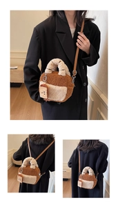 Close-up of fluffy brown and beige fleece bowling bag with cute toast pendant detail