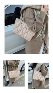 Detail of beige quilted tote bag with large capacity and soft faux leather texture
