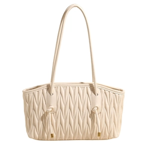 Elegante borsa tote beige trapuntata con pieghe a onda e manici con nodi dorati