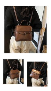 Brown vintage faux leather backpack featuring decorative buckle and adjustable straps