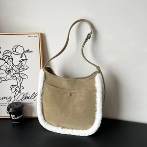 Khaki faux suede bucket bag with white plush trim and adjustable shoulder strap for women