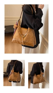 Detail of caramel tote bag featuring matte suede splicing and golden buckle closure