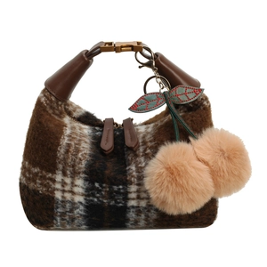 Retro plaid plush handbag for women with brown leather handles and cherry pompom charm