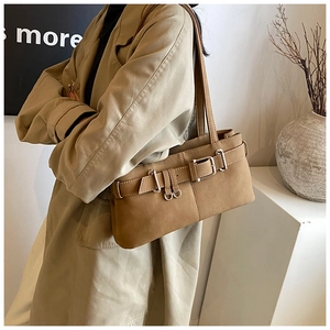 Brown faux leather shoulder bag with lychee texture and silver metal hardware accents