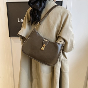 Retro dark brown oil wax leather shoulder bag with vintage gold buckle for daily commuting