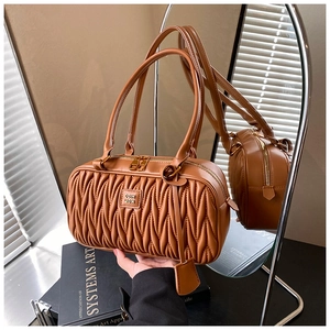 Brown pleated underarm shoulder bag detail, retro style large capacity pillow bag design.