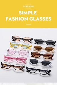 Close-up of stylish cat-eye half-frame sunglasses in multiple colors with metal trim