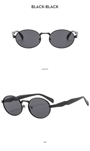 Macro view of oval vintage sunglasses in black with metal hinges and sleek side profile