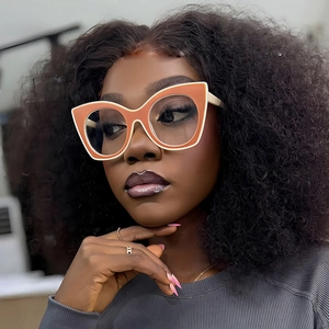 Chic two-tone orange and white cat-eye sunglasses with large fashion frames for women